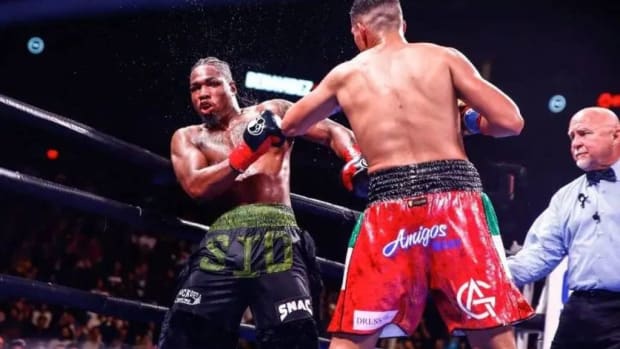 Kyrone Davis(L) and  David El Bandera Roja Benavidez exchange punches during their 12 round super middleweight bout in Phoenix, AZ. On Saturday, March 30, from T-Mobile Arena in Las Vegas, Kyrone Davis will square off against Elijah Garcia. ALEJANDRO SALAZAR/PXIMAGES/ICON SPORTSWIRE VIA GETTY IMAGES.